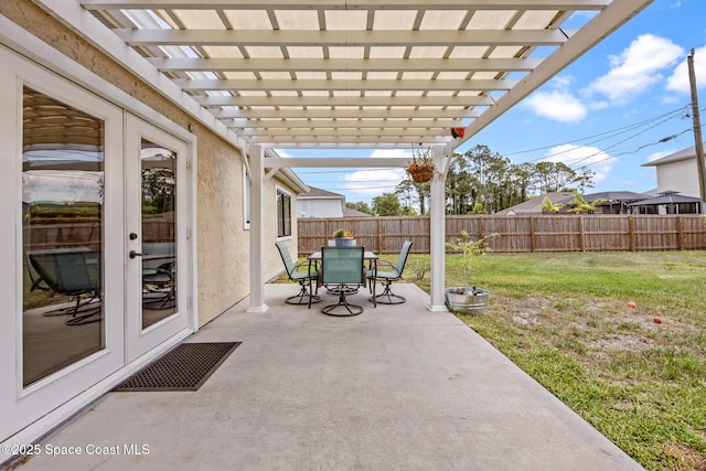 946 Stage St SE, Palm Bay, FL 32909 - view of patio / terrace with french doors, a pergola, and outdoor dining space