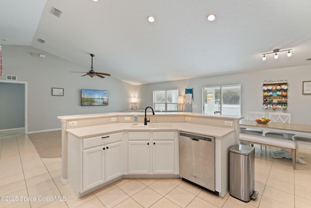 4070 Orion Way, Rockledge, FL 32955 - kitchen featuring stainless steel dishwasher, a sink, open floor plan, lofted ceiling, and light tile patterned flooring