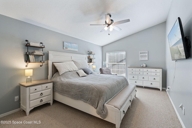 4070 Orion Way, Rockledge, FL 32955 - bedroom with carpet, baseboards, vaulted ceiling, and a ceiling fan