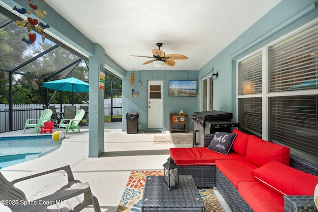 4070 Orion Way, Rockledge, FL 32955 - view of patio featuring a ceiling fan, an outdoor living space, and glass enclosure