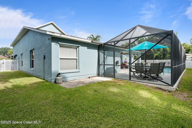 4070 Orion Way, Rockledge, FL 32955 - rear view of house with a patio, a lanai, and stucco siding