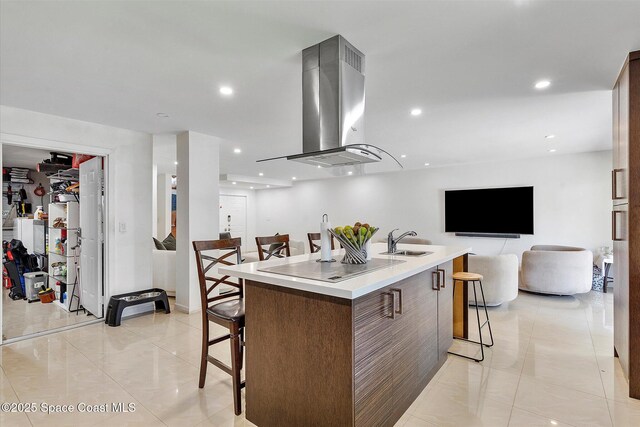 253 NE 212th Ter, Miami, FL 33177 - kitchen featuring island range hood, a sink, open floor plan, a breakfast bar area, and recessed lighting