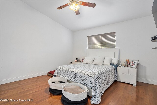 253 NE 212th Ter, Miami, FL 33177 - bedroom with baseboards, wood finished floors, lofted ceiling, and a ceiling fan