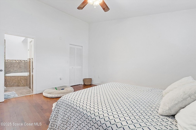 253 NE 212th Ter, Miami, FL 33177 - bedroom with wood finished floors, baseboards, a ceiling fan, and ensuite bathroom