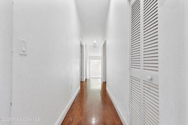 253 NE 212th Ter, Miami, FL 33177 - hall with dark wood-type flooring and baseboards