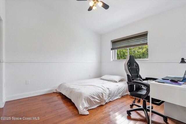 253 NE 212th Ter, Miami, FL 33177 - bedroom featuring lofted ceiling, a desk, wood finished floors, baseboards, and ceiling fan