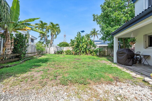 253 NE 212th Ter, Miami, FL 33177 - view of yard with a wooden deck