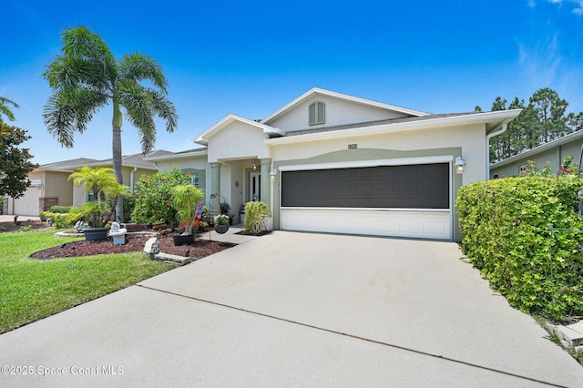 2263 Chinaberry Cir SE, Palm Bay, FL 32909 - ranch-style home featuring driveway, an attached garage, stucco siding, and a front lawn