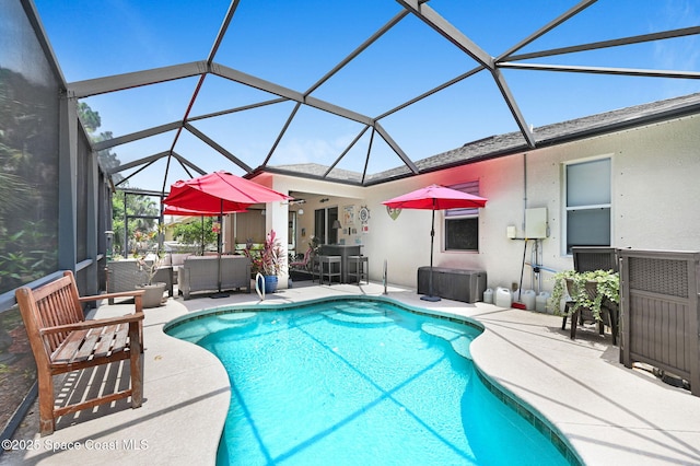 2263 Chinaberry Cir SE, Palm Bay, FL 32909 - swimming pool featuring an outdoor living space, a patio area, and glass enclosure
