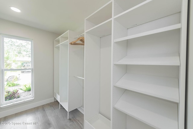 3201 Nottingham Ln, Cocoa, FL 32926 - walk in closet with wood finished floors