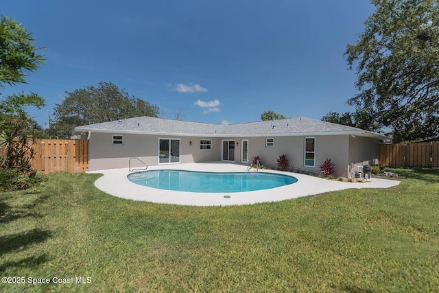 3201 Nottingham Ln, Cocoa, FL 32926 - rear view of house with stucco siding and a patio