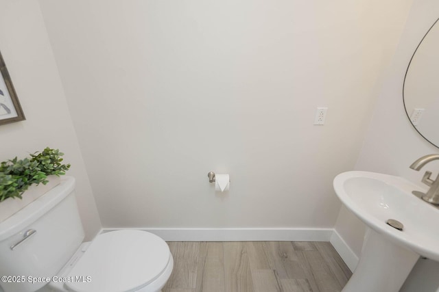 3201 Nottingham Ln, Cocoa, FL 32926 - half bath with wood finished floors and toilet
