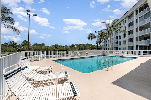 1410 Huntington Ln Unit 1204, Rockledge, FL 32955 - community pool with a patio