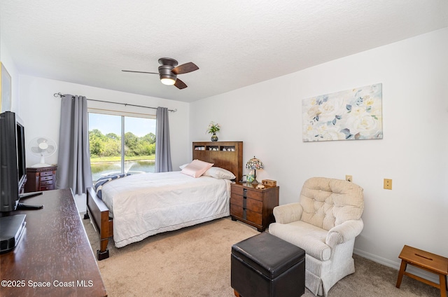 1410 Huntington Ln Unit 1204, Rockledge, FL 32955 - bedroom with light carpet and a ceiling fan