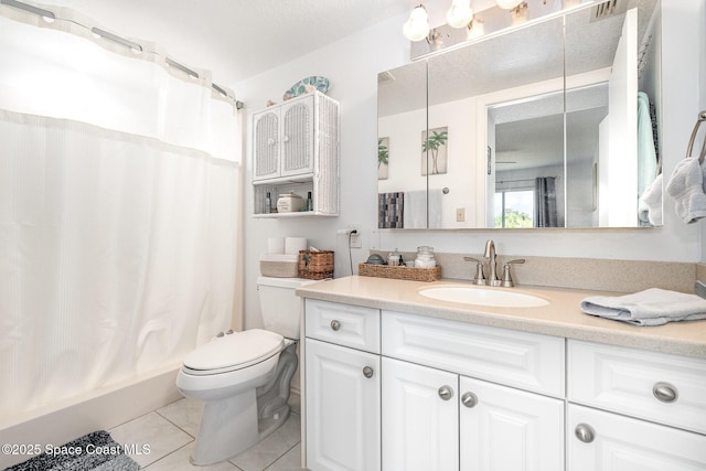 1410 Huntington Ln Unit 1204, Rockledge, FL 32955 - full bathroom featuring tile patterned flooring, vanity, toilet, and shower / tub combo with curtain