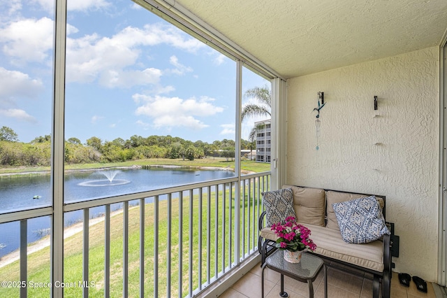 1410 Huntington Ln Unit 1204, Rockledge, FL 32955 - sunroom featuring a water view
