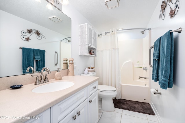 1410 Huntington Ln Unit 1204, Rockledge, FL 32955 - full bathroom with vanity, tile patterned floors, shower / tub combo with curtain, and toilet