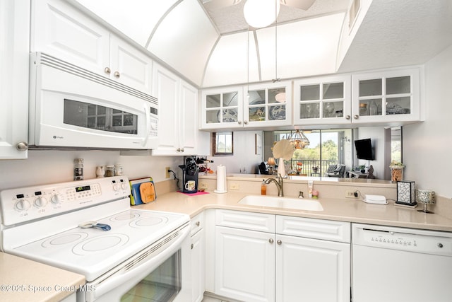 1410 Huntington Ln Unit 1204, Rockledge, FL 32955 - kitchen with white appliances, a sink, glass insert cabinets, and white cabinets