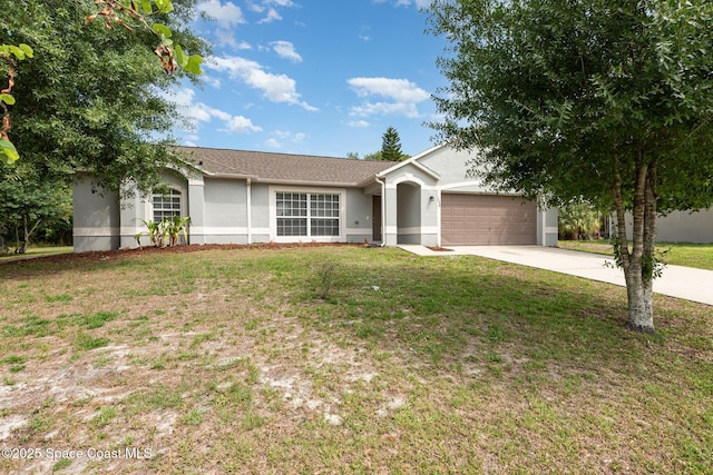 1094 Locust Ave NW, Palm Bay, FL 32907 - ranch-style house with stucco siding, concrete driveway, an attached garage, and a front lawn