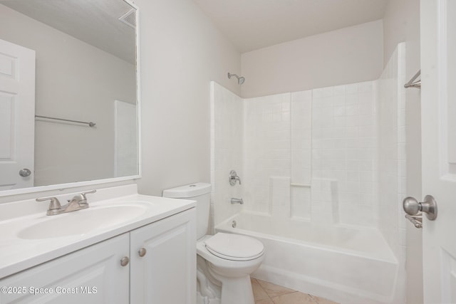 1094 Locust Ave NW, Palm Bay, FL 32907 - bathroom featuring toilet, bathtub / shower combination, vanity, and tile patterned floors
