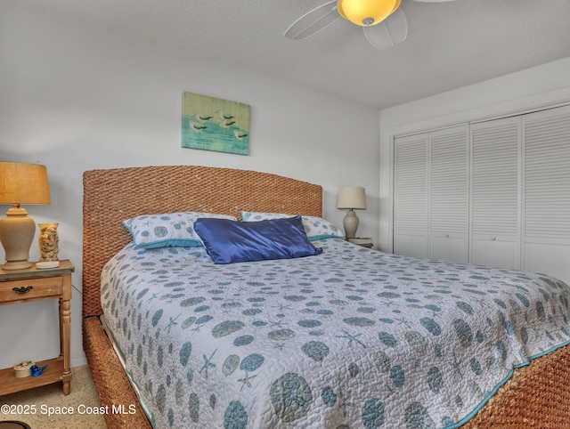 3150 N Atlantic Ave Unit 4-990, Cocoa Beach, FL 32931 - bedroom with a closet, ceiling fan, and carpet flooring
