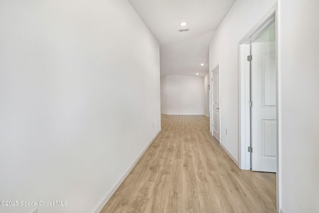 2597 Galiano Ave, Palm Bay, FL 32908 - corridor featuring light wood-style floors, recessed lighting, and baseboards