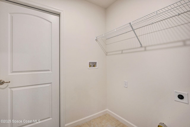2597 Galiano Ave, Palm Bay, FL 32908 - washroom with electric dryer hookup, hookup for a washing machine, baseboards, and light tile patterned flooring