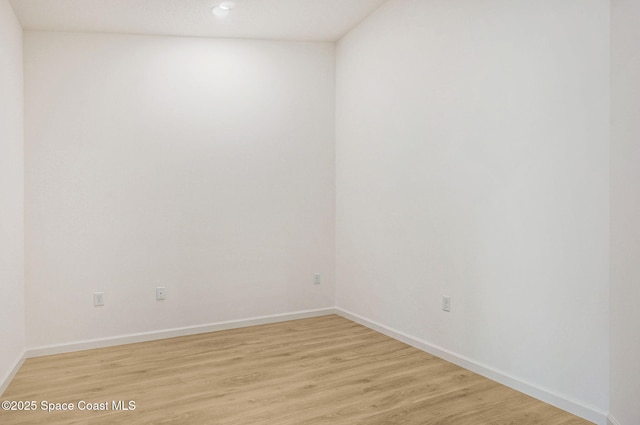 2597 Galiano Ave, Palm Bay, FL 32908 - spare room with light wood finished floors, baseboards, and recessed lighting