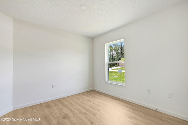 2597 Galiano Ave, Palm Bay, FL 32908 - unfurnished room featuring light wood-type flooring and baseboards