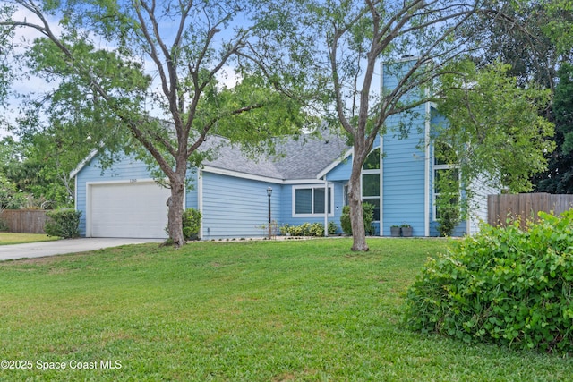 1250 York Cir, Melbourne, FL 32904 - view of front of home featuring driveway and an attached garage