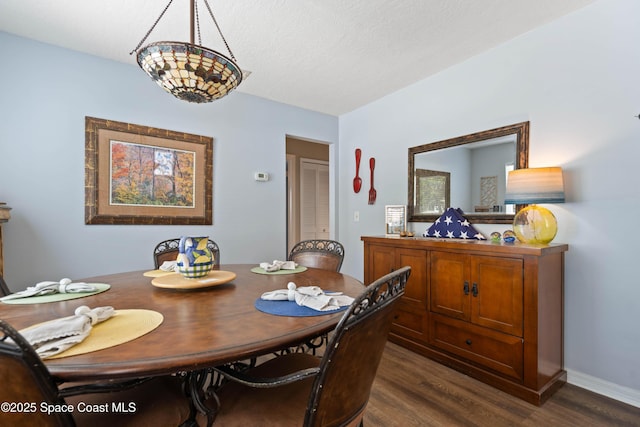 1250 York Cir, Melbourne, FL 32904 - dining room with dark wood finished floors and baseboards