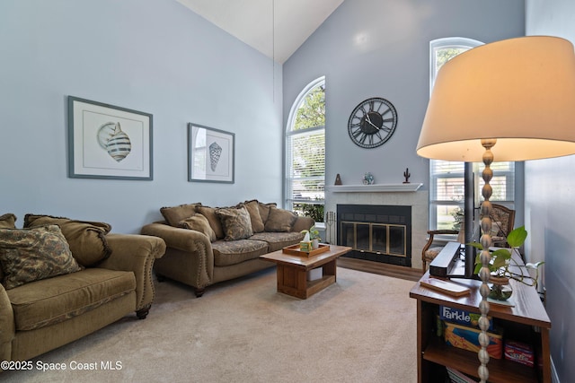 1250 York Cir, Melbourne, FL 32904 - living area with high vaulted ceiling and a tile fireplace