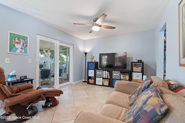 1250 York Cir, Melbourne, FL 32904 - living area with ceiling fan and light tile patterned floors
