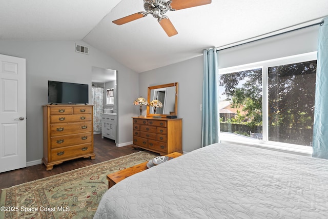 1250 York Cir, Melbourne, FL 32904 - bedroom with wood finished floors, lofted ceiling, baseboards, ceiling fan, and ensuite bath