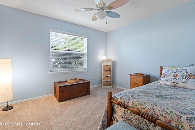 1250 York Cir, Melbourne, FL 32904 - bedroom featuring carpet floors, baseboards, and ceiling fan
