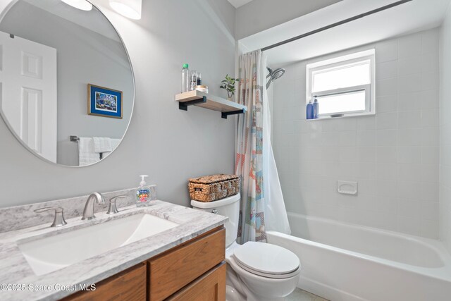 1250 York Cir, Melbourne, FL 32904 - full bathroom with toilet, vanity, and shower / tub combo