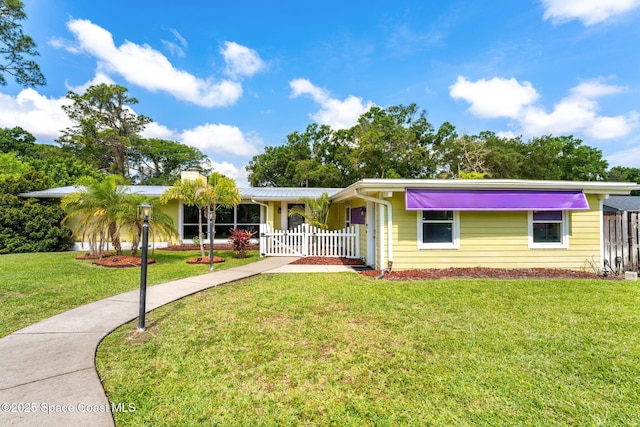 996 S Wickham Rd, West Melbourne, FL 32904 - ranch-style home featuring a gate