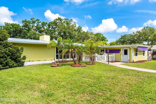 996 S Wickham Rd, West Melbourne, FL 32904 - view of yard featuring a gate