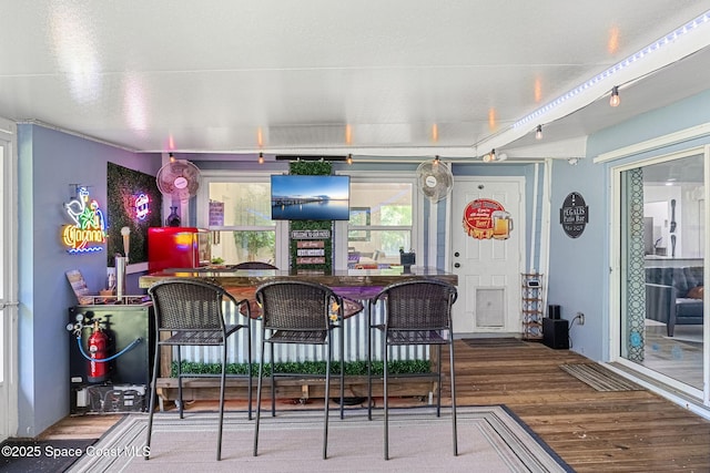 996 S Wickham Rd, West Melbourne, FL 32904 - bar featuring wood finished floors