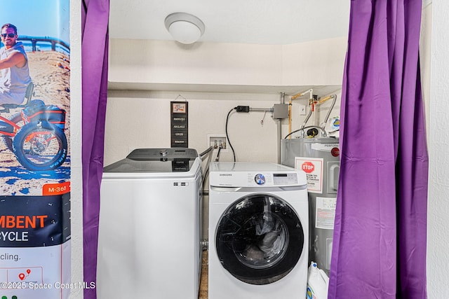 996 S Wickham Rd, West Melbourne, FL 32904 - washroom featuring water heater and washer and dryer
