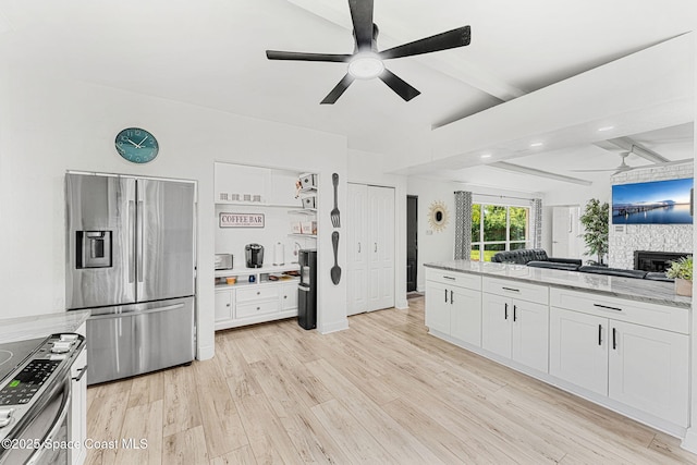 996 S Wickham Rd, West Melbourne, FL 32904 - kitchen with appliances with stainless steel finishes, ceiling fan, open floor plan, beam ceiling, and white cabinets