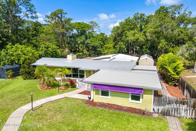 996 S Wickham Rd, West Melbourne, FL 32904 - mid-century inspired home featuring a chimney