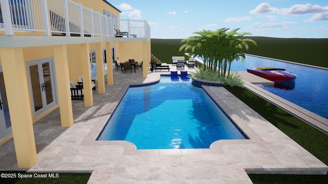 520 Bahama Dr, Indian Harbour Beach, FL 32937 - swimming pool featuring a patio area and french doors