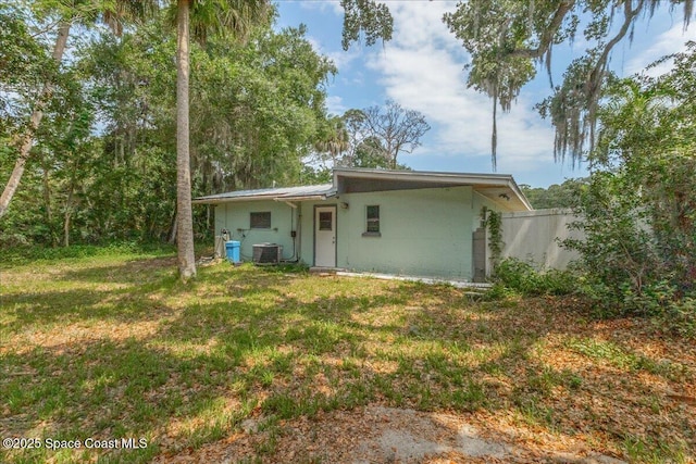 2835 Sunset Rd, Melbourne, FL 32904 - rear view of house with central AC unit