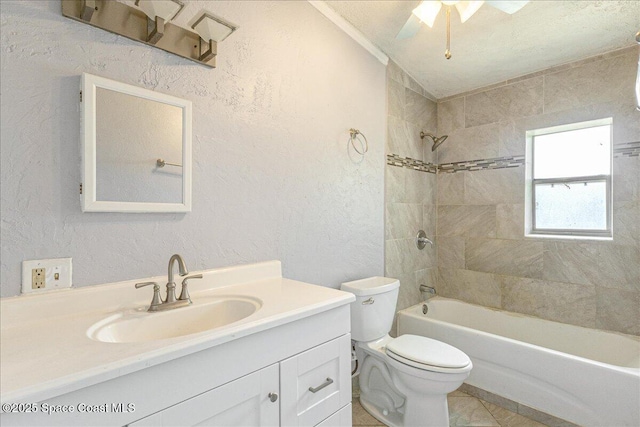 2835 Sunset Rd, Melbourne, FL 32904 - full bath with toilet, vanity, a textured wall, bathing tub / shower combination, and ceiling fan