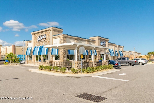2835 Sunset Rd, Melbourne, FL 32904 - view of property featuring uncovered parking