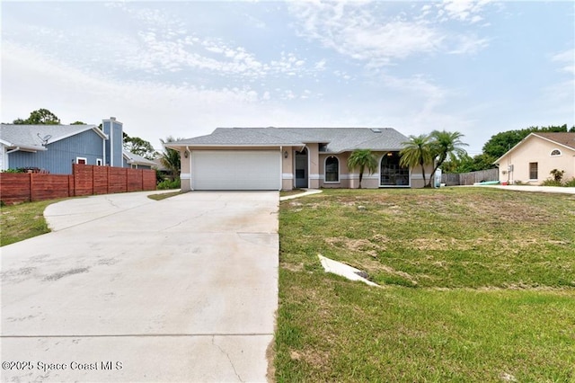 749 Tulip Dr, Sebastian, FL 32958 - ranch-style home featuring concrete driveway and an attached garage