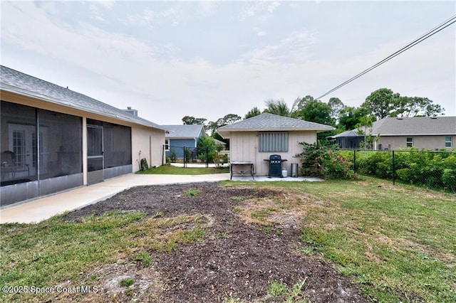 749 Tulip Dr, Sebastian, FL 32958 - view of yard featuring a patio area and a sunroom