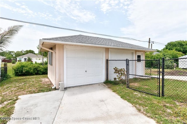 749 Tulip Dr, Sebastian, FL 32958 - detached garage with a gate