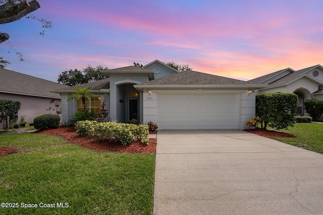 2020 Twelve Oaks Dr SE, Palm Bay, FL 32909 - single story home with an attached garage, concrete driveway, a front lawn, stucco siding, and roof with shingles